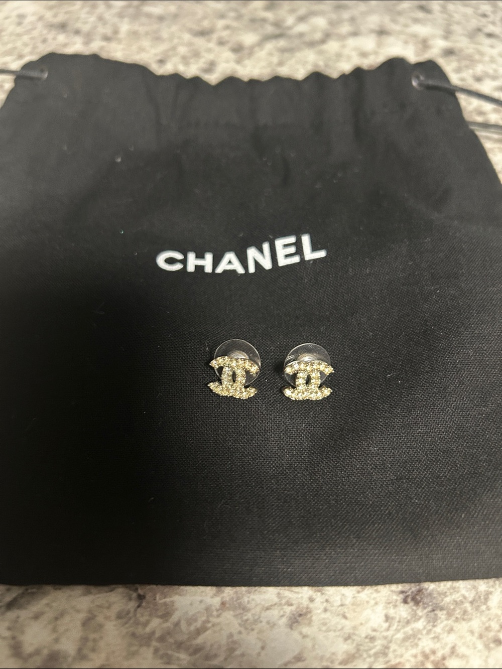 CHANEL Gold CC Logo Crystal earrings.